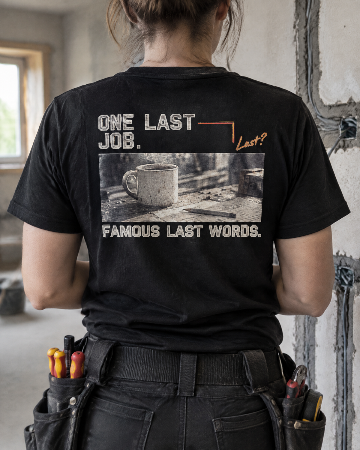 One Last Job tee, back print, worn by an electrician on site