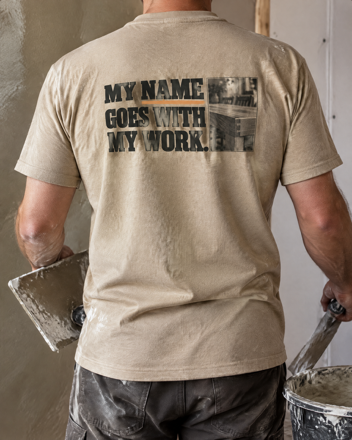 My Name Goes With My Work tee, back print, worn by a plasterer