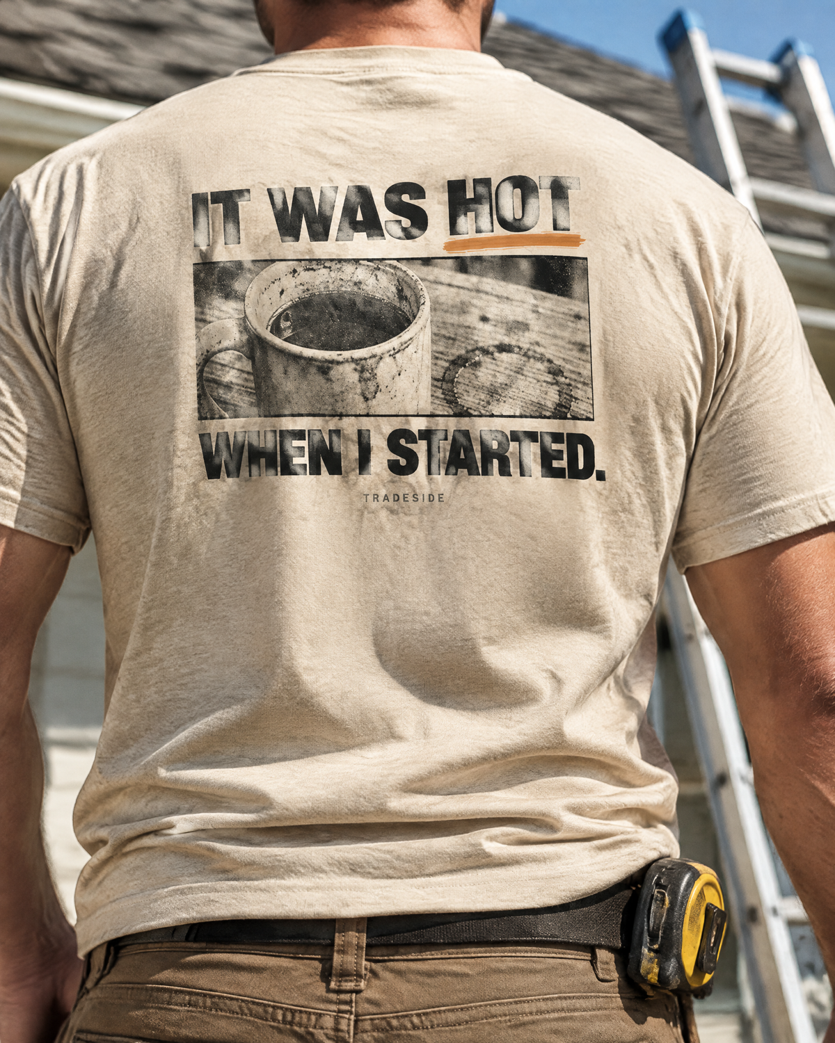 It Was Hot When I Started tee, back print, worn by a roofer